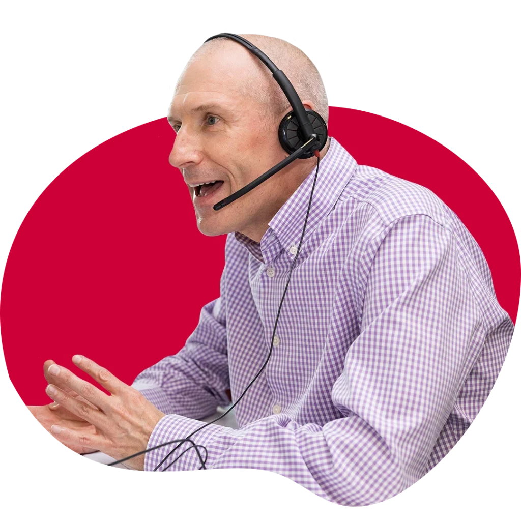 mike talking with headset at the regenda group office