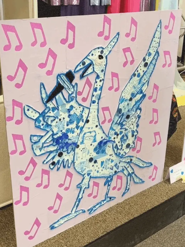 Liver Bird filled with children's art associated with Eurovision, music notes, in blue